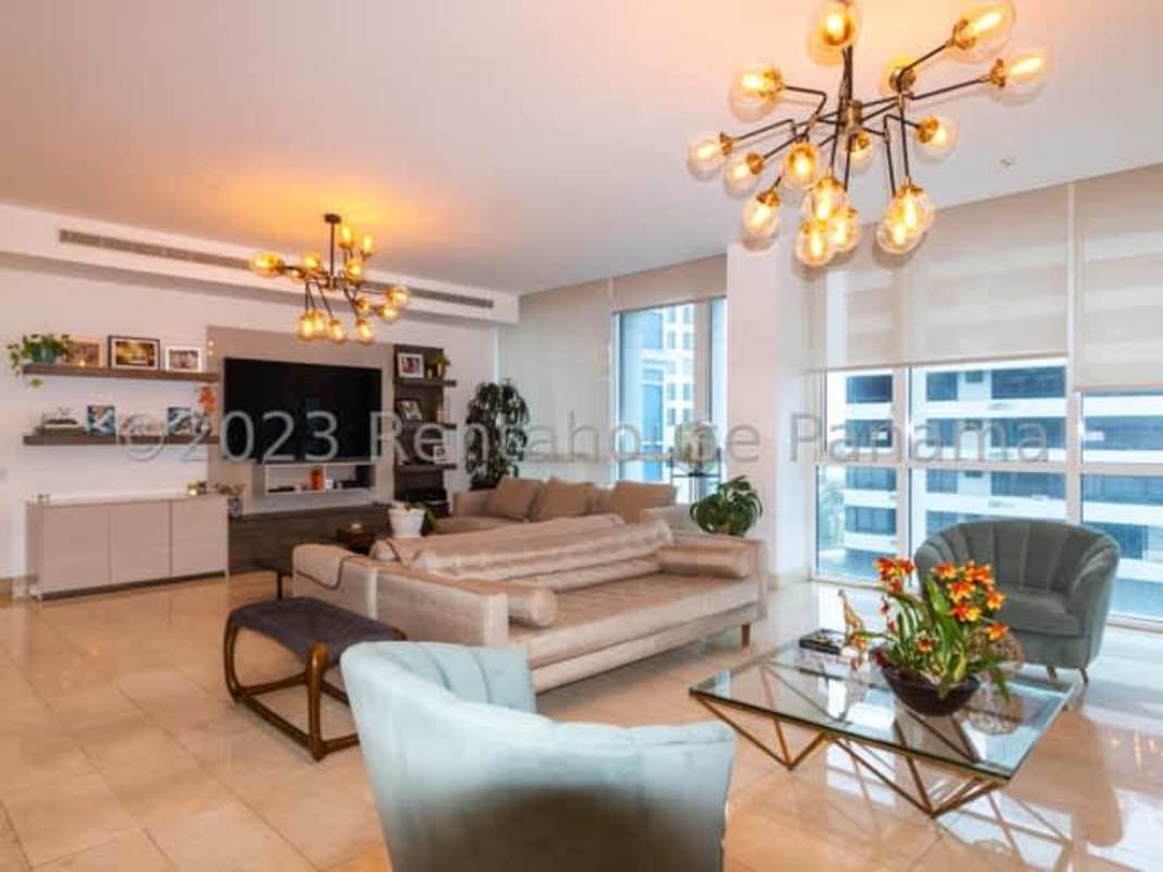 Living room with large windows panoramic ocean and city views in PH Santorini Coco del Mar