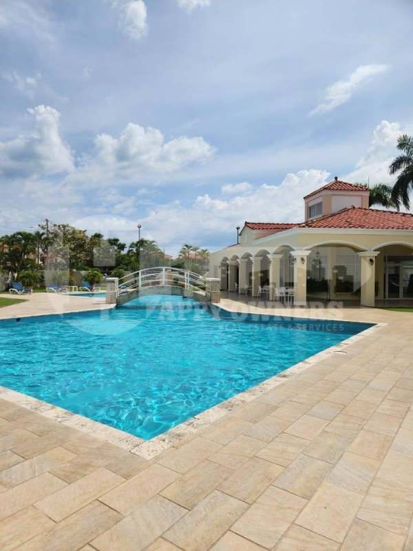 Terrace patio with wicker furniture garden view Villa Valencia in Costa Sur Panama
