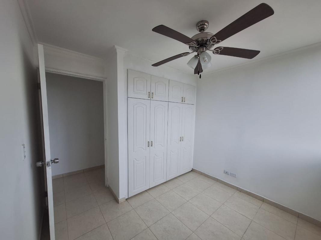 Curved balcony overlooking Panama City skyline in Betania apartment for sale