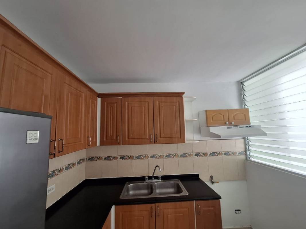 Bathroom with tiled shower, glass doors, single sink vanity Betania Panama apartment