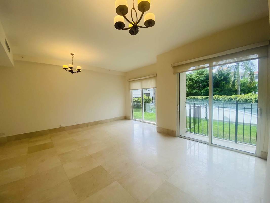 Spacious open-plan living dining with marble tile flooring at The Reserve Santa María Panama