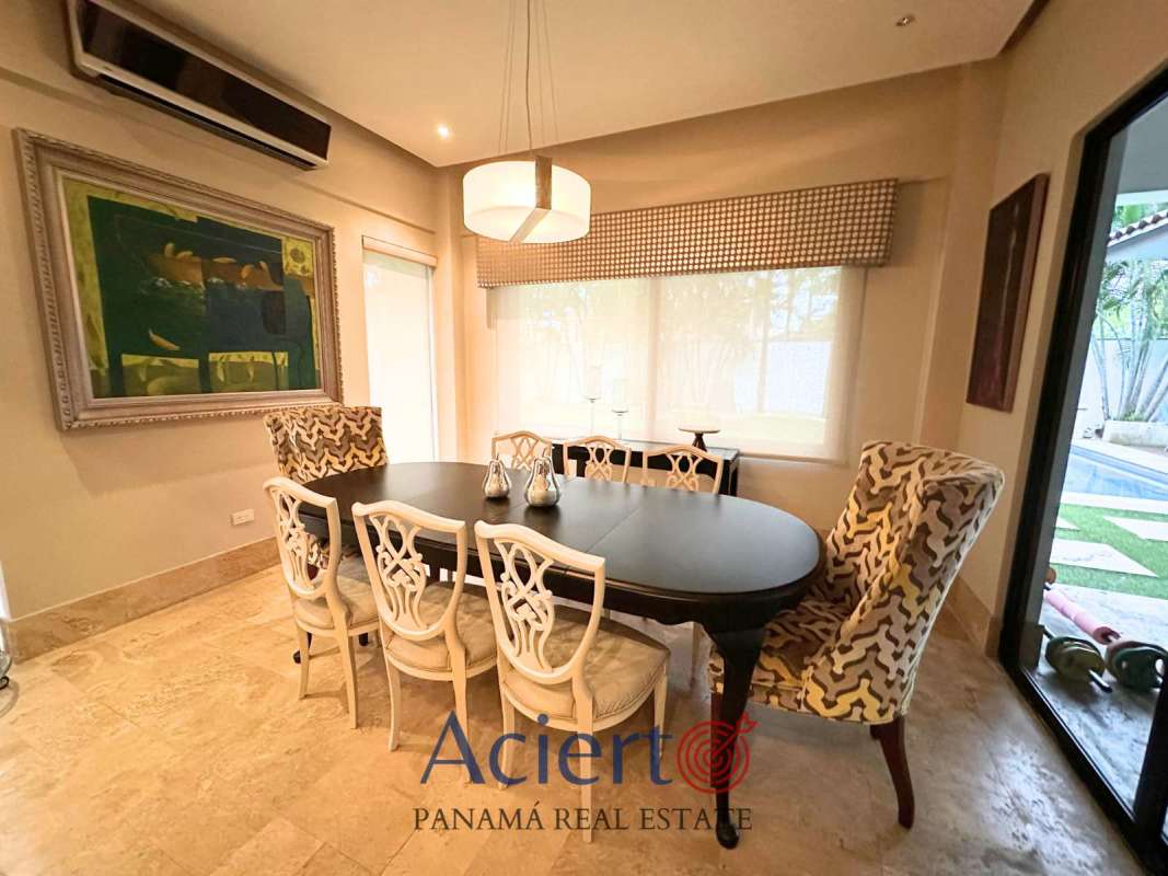 Elegant bar lounge with granite countertop, TV, modern lighting at Residencial Antigua Panama