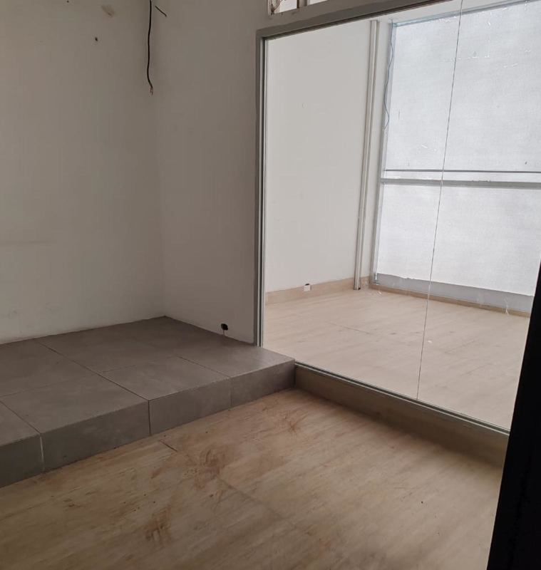 Bare concrete shell interior with plumbing fixtures and open plan commercial unit San Francisco