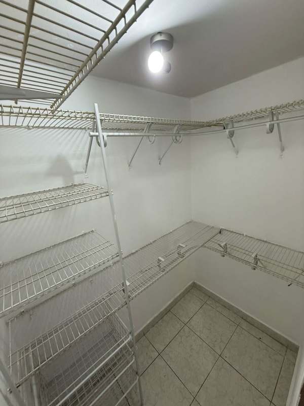 Contemporary open plan kitchen with dining and living area PH St Emillion Panama apartment rental