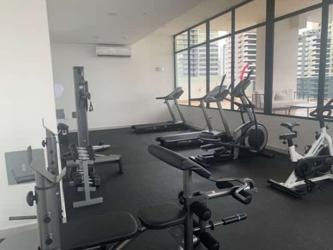 Clean modern bathroom with vessel sink, glass shower in PH Carreras Panama