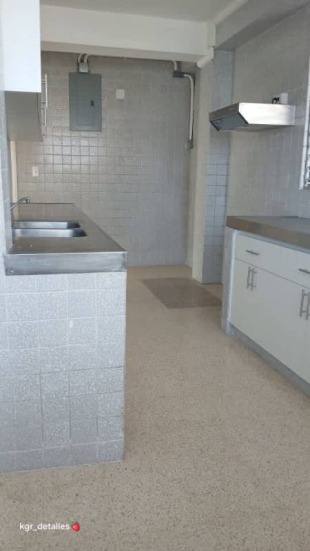 Bedroom featuring built-in closet and large window in PH Baleares Villa de las Fuentes
