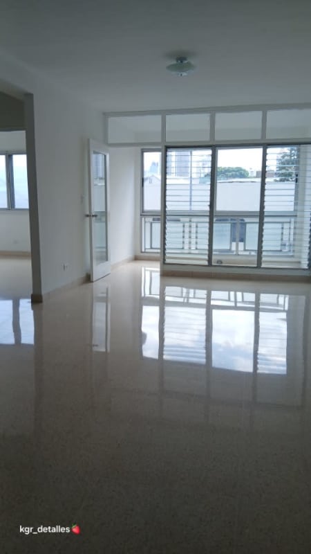 Kitchen area with cabinetry, double sink, extractor, and large window in PH Baleares Panama