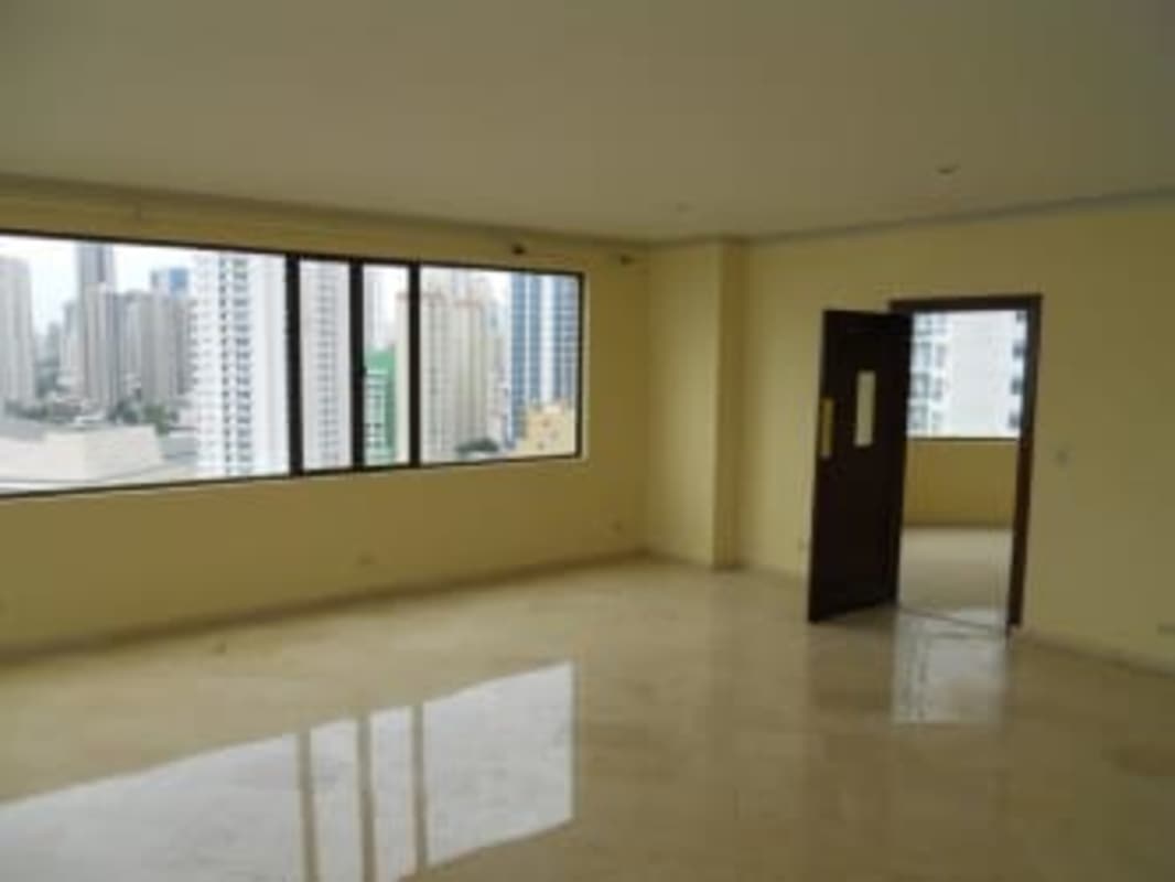 Spacious open entertainment room with marble flooring in PH Belvedere Panama City luxury condo