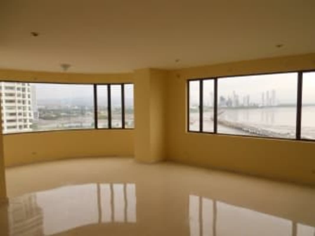 Spacious modern living room with panoramic ocean and city views Coco del Mar Panama