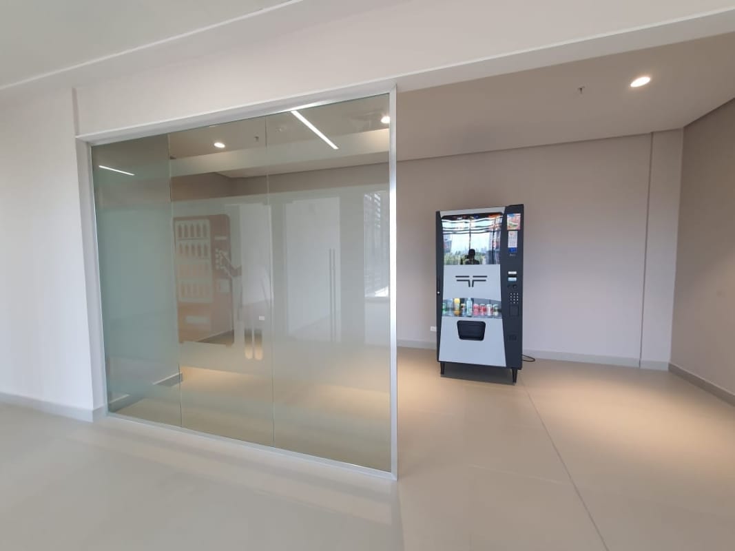 Spacious lobby with vending machines and minimalist design at Town Center Costa del Este Panama