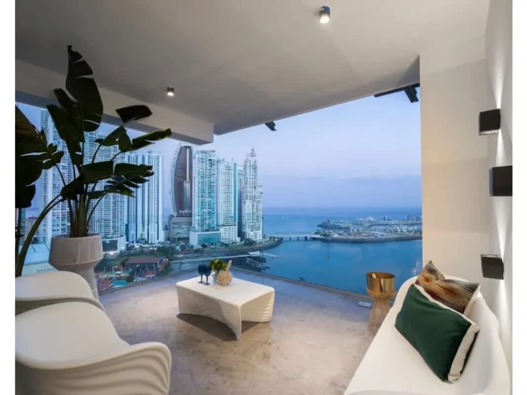 Large balcony overlooking Pacific Ocean and Panama City skyline at PH Sea Point Punta Paitilla Panama