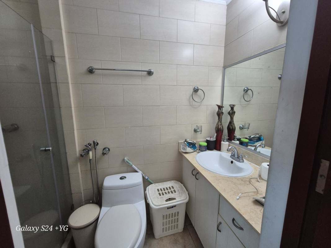 Contemporary bathroom with glass enclosed shower and vanity in PH 7400 San Francisco