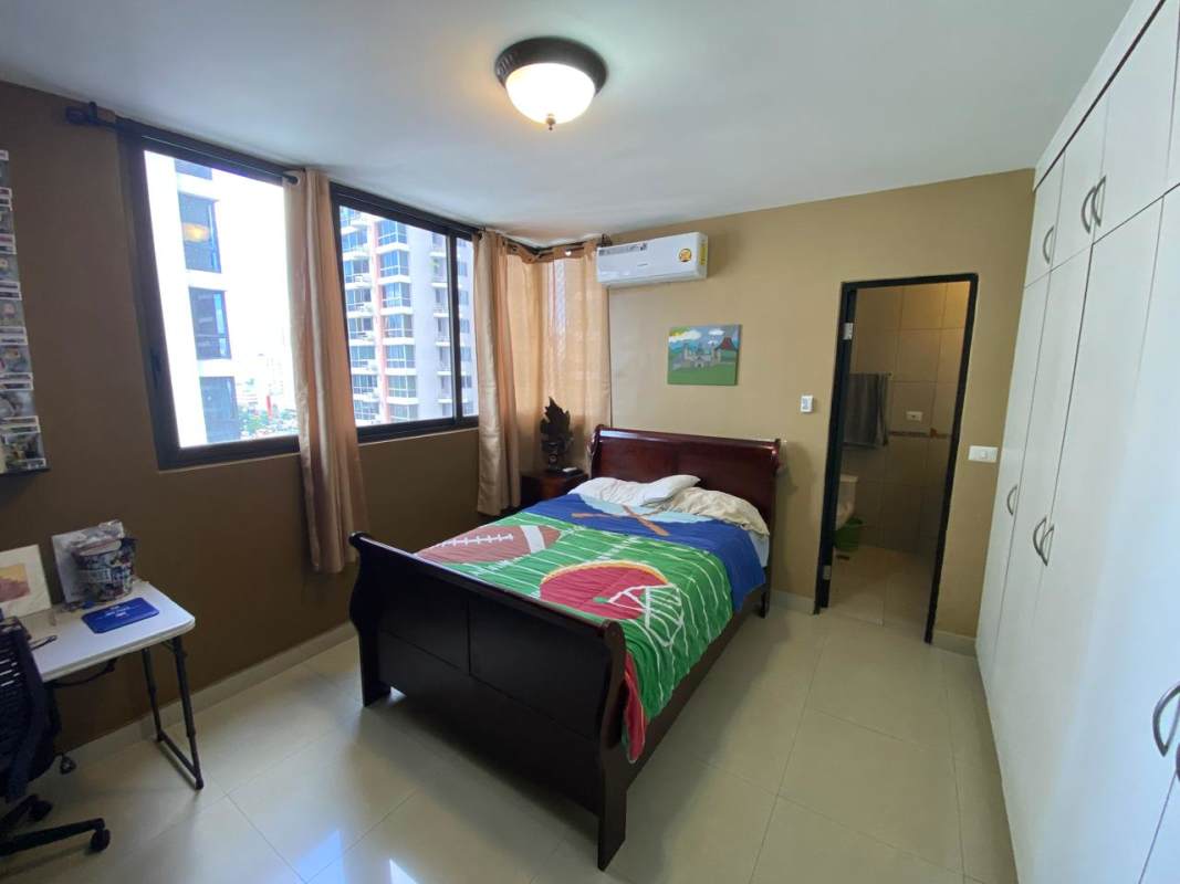 Modern kitchen with granite countertops, wood cabinets, appliances in SF Bay Tower 400 Panama