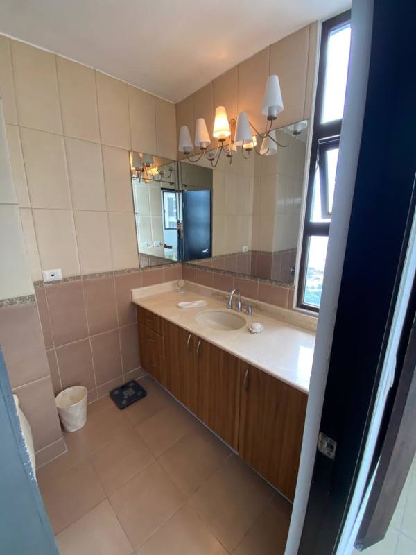 Bright master bedroom with large window ocean views en suite bath San Francisco Bay Tower 400 Panama City