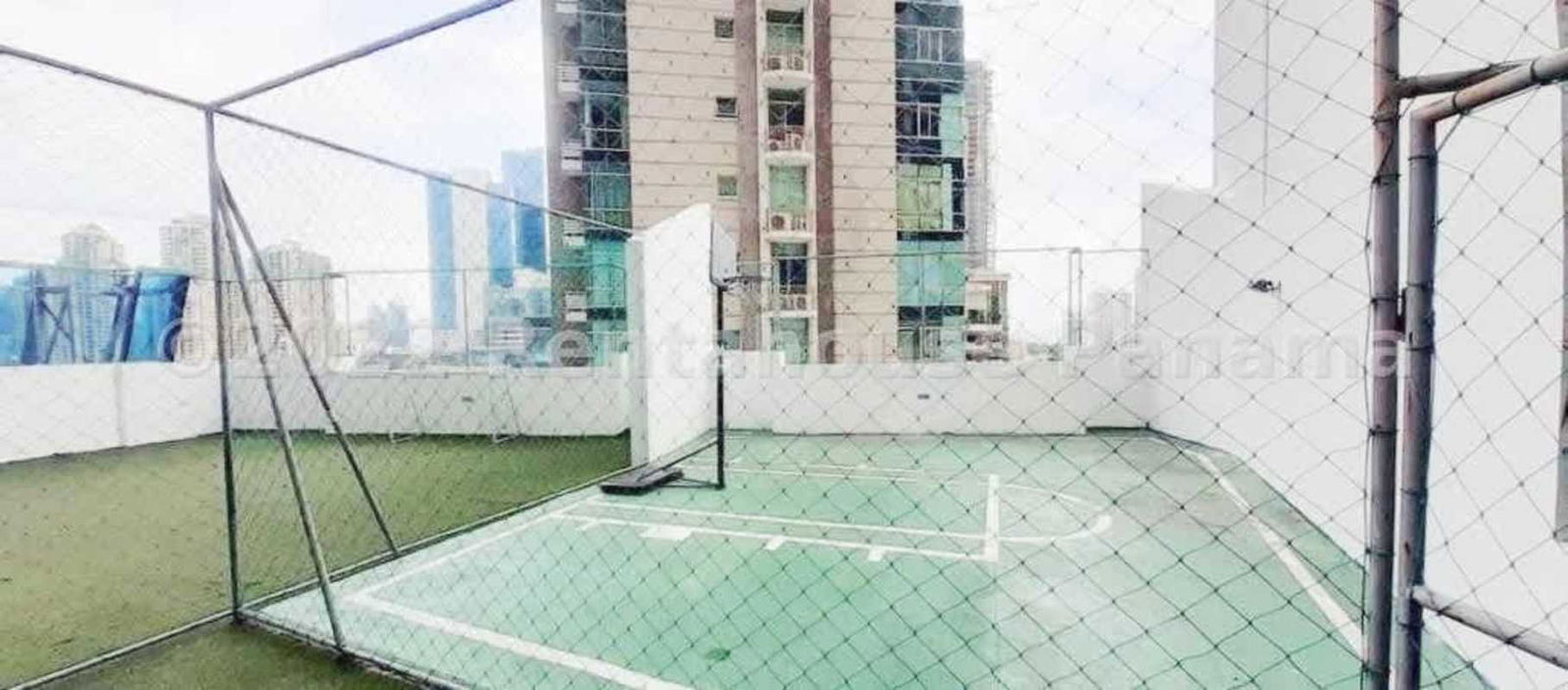 Infinity swimming pool with ocean views and skyline backdrop at Grand Tower Panama City