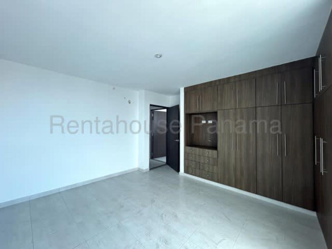 Bedroom in PH Trinity El Carmen with built-in wardrobe and large window overlooking city