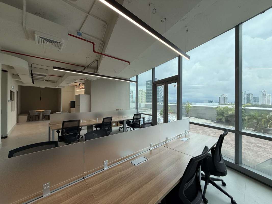 Bright open office area with floor-to-ceiling windows and terrace in Financial Park Costa del Este Panama