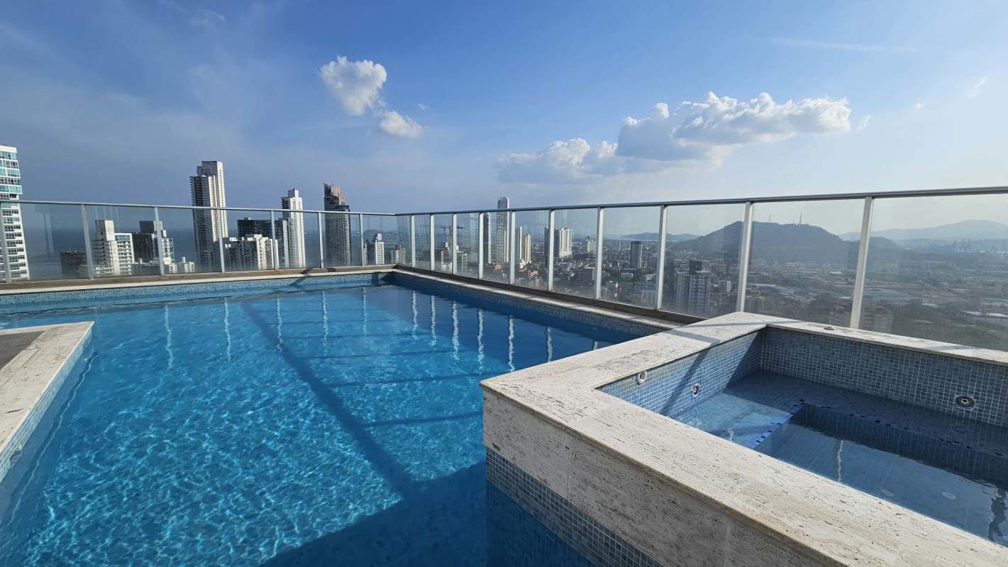 Rooftop infinity swimming pool with jacuzzi and panoramic skyline views PH Signature Point