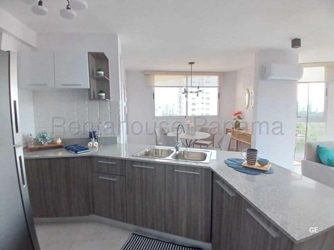 Modern living room with large windows, cityscape view PH Park Oasis Panama