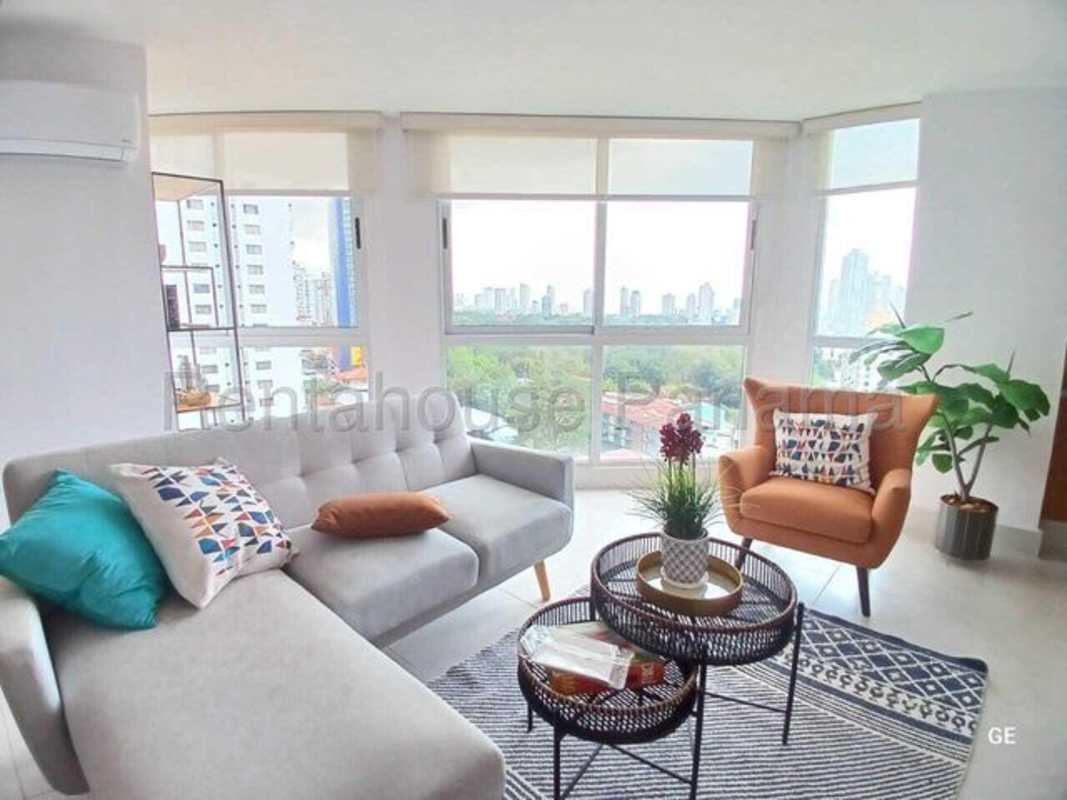 Modern apartment living room with large windows city view PH Park Oasis Carrasquilla Panama