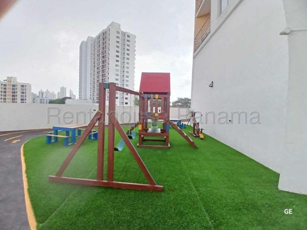Kids playground with swings, slide artificial grass PH Park Oasis Panama
