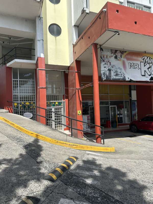 Mystic Park Plaza entrance and parking area with signage in Juan Díaz Panama City