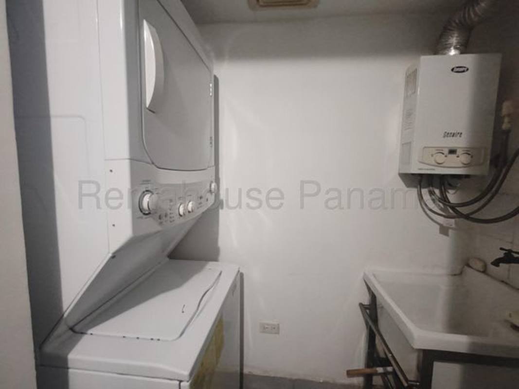 Open living and dining space with ceiling fan and tile flooring Carrasquilla Plaza