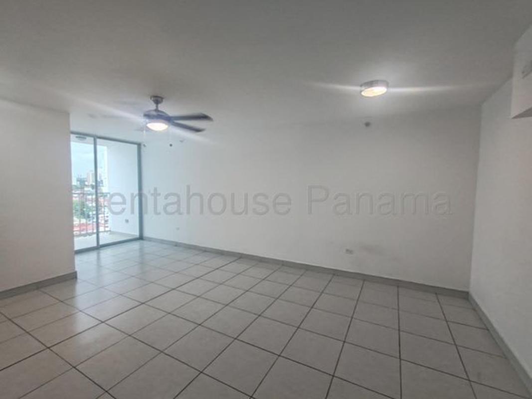 Unfurnished living room with sliding balcony doors and views in Carrasquilla Plaza Panama