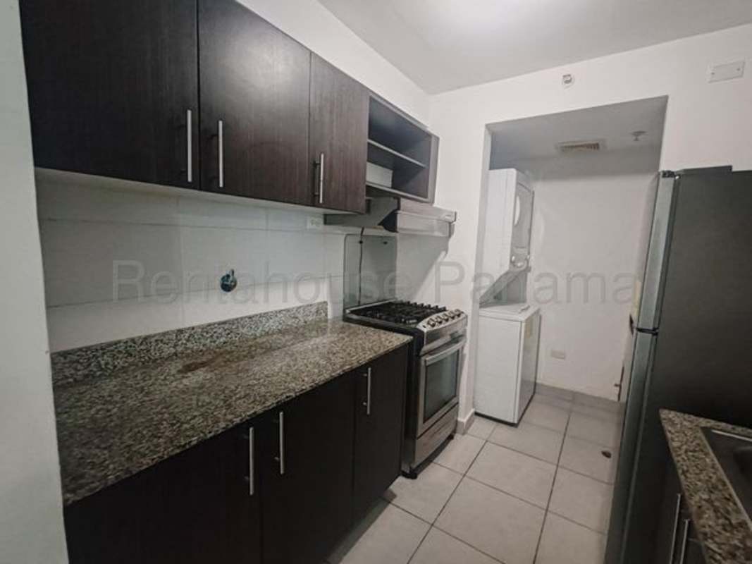 Modern compact kitchen with granite countertops in PH Carrasquilla Plaza Panama