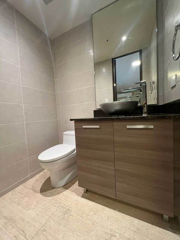 Contemporary designer kitchen with island and appliances in The Regent Costa del Este Panama