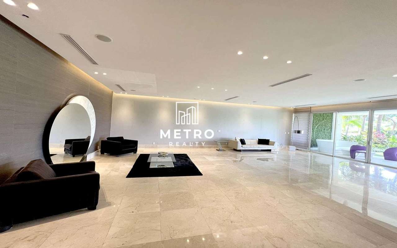 Elegant modern living room with marble floors at The Reserve Panama apartment for sale