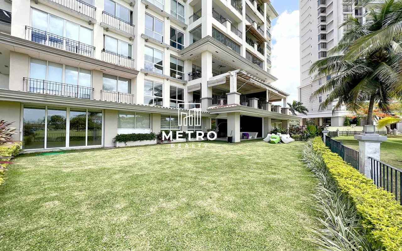 Modern bathroom with marble and double vanity in The Reserve apartment Panama