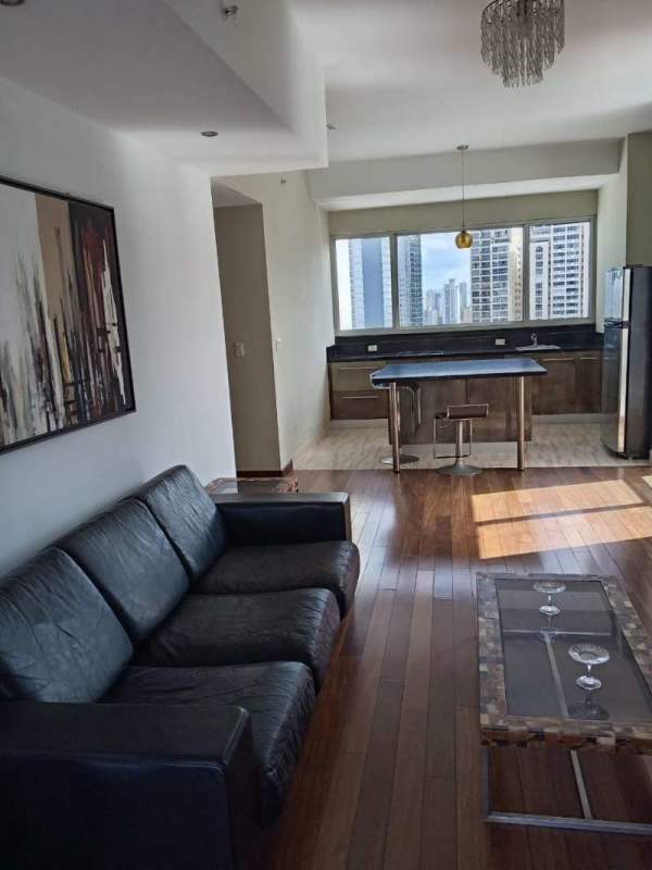 Bathroom with double vanity sinks and glass shower enclosure at PH Denovo Obarrio Panama City