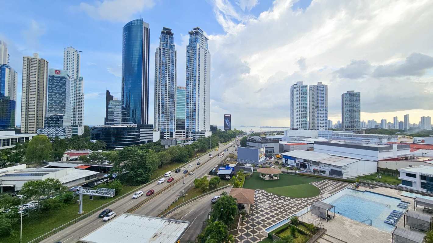 Master bedroom with skyline view, large windows in PH Sevilla Costa del Este