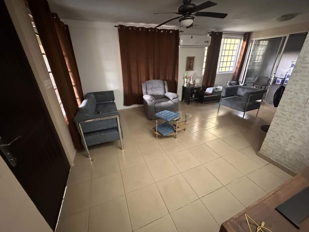 Contemporary kitchen with black cabinetry and pass-through Villa Zaita Panama