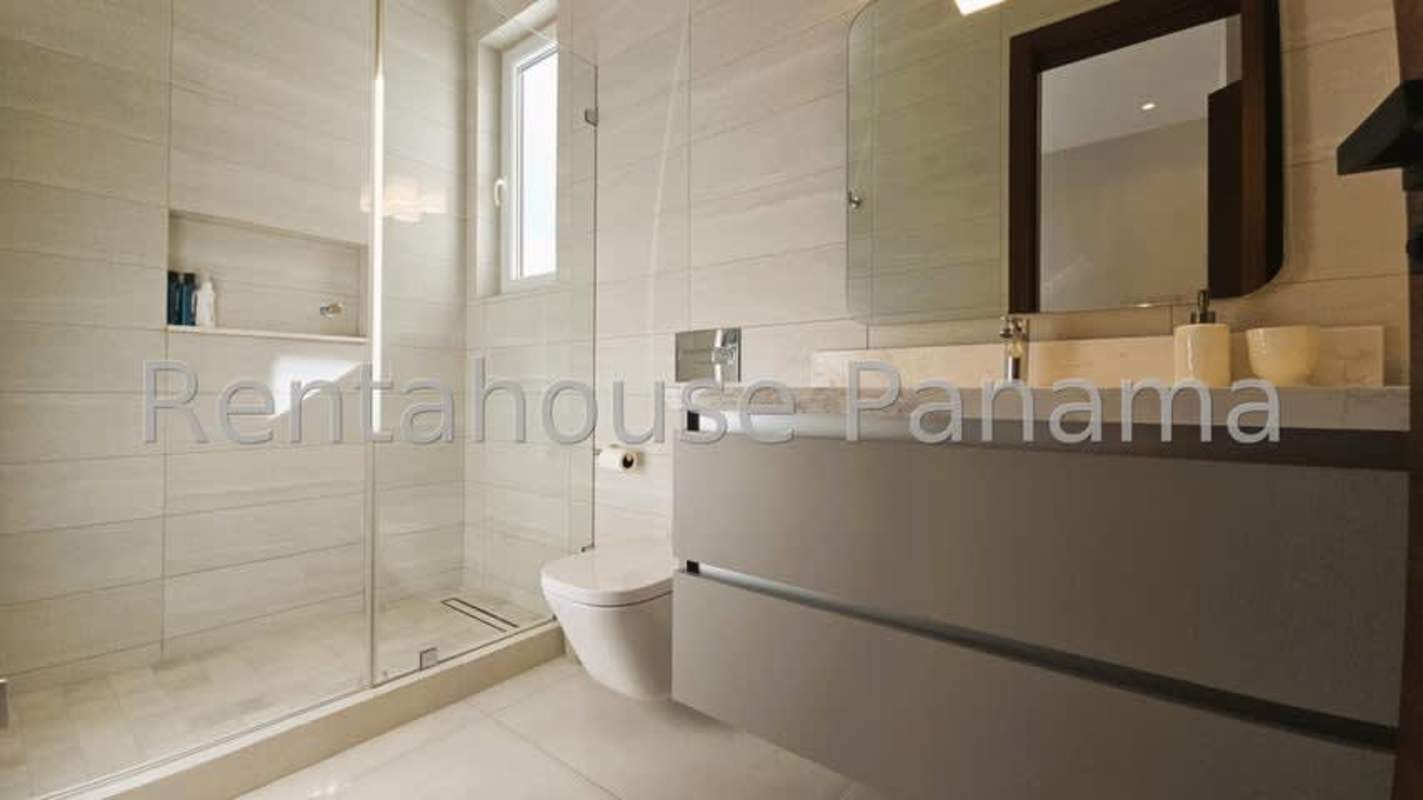 Contemporary bathroom with double sink vanity, glass shower in luxury house Santa Maria Panama