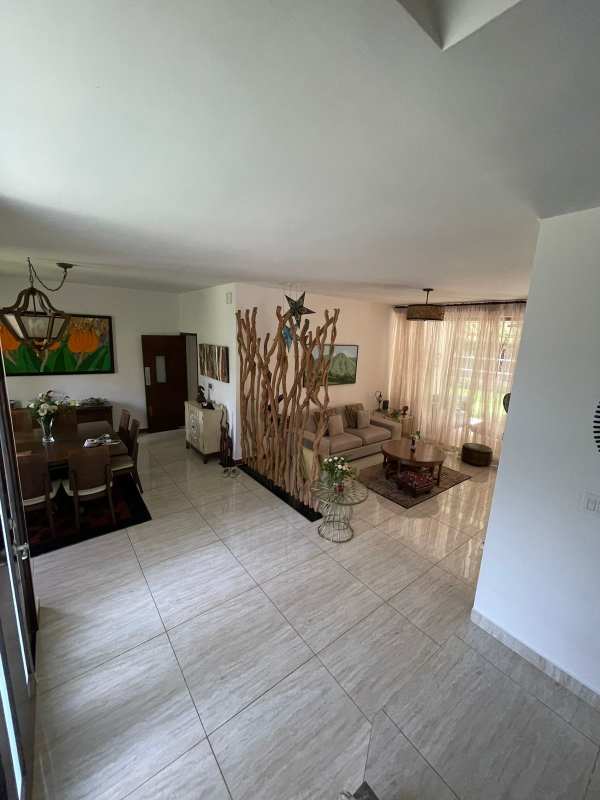 Private backyard with green garden and outdoor terrace Embassy Gardens Clayton Panama