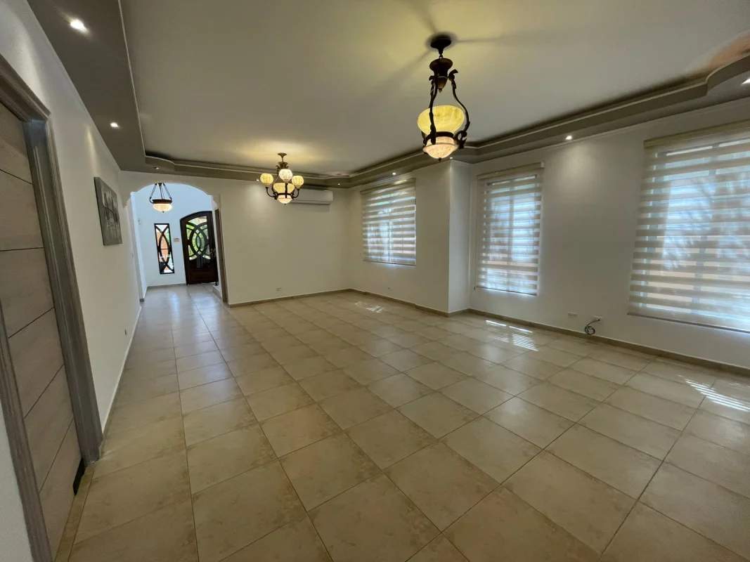 Luxury private swimming pool surrounded by tropical garden in Clayton Village Panama rental house