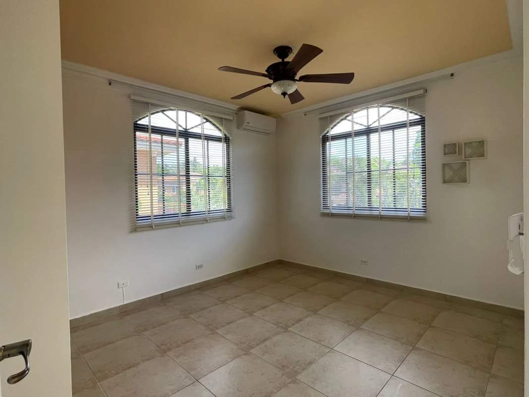 Spacious kitchen with granite countertops, stainless appliances in Clayton Village house Panama