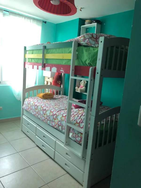 Kitchen with granite countertops, dark cabinets, stainless appliances at PH Clayton Park in Clayton Panama City