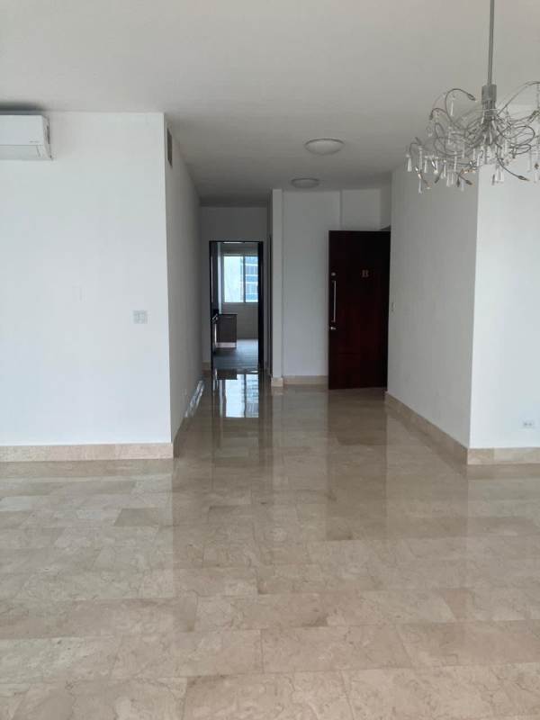 Spacious modern kitchen with granite countertops, wooden cabinets, stainless steel appliances PH Pacific Village Punta Pacifica Panama