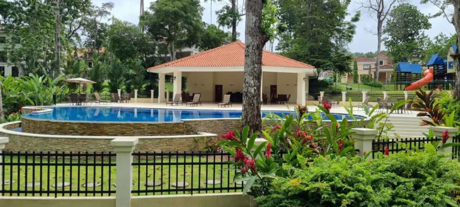 Modern kitchen with center island, granite countertops, double refrigerator in Clayton house rental