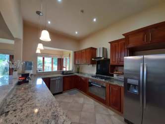 Contemporary bathroom with soaking tub, double vanity, separate shower in mountain home Boquete