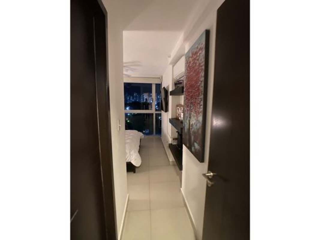 Open plan living dining area with access to balcony in PH Parque Lefevre Panama City