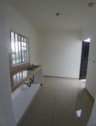 Minimalist kitchen with sink window and ceramic counters Boquerón Chiriquí Panama