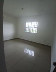 Contemporary bathroom with tiled walls, walk-in shower, pedestal sink Boquerón Panama