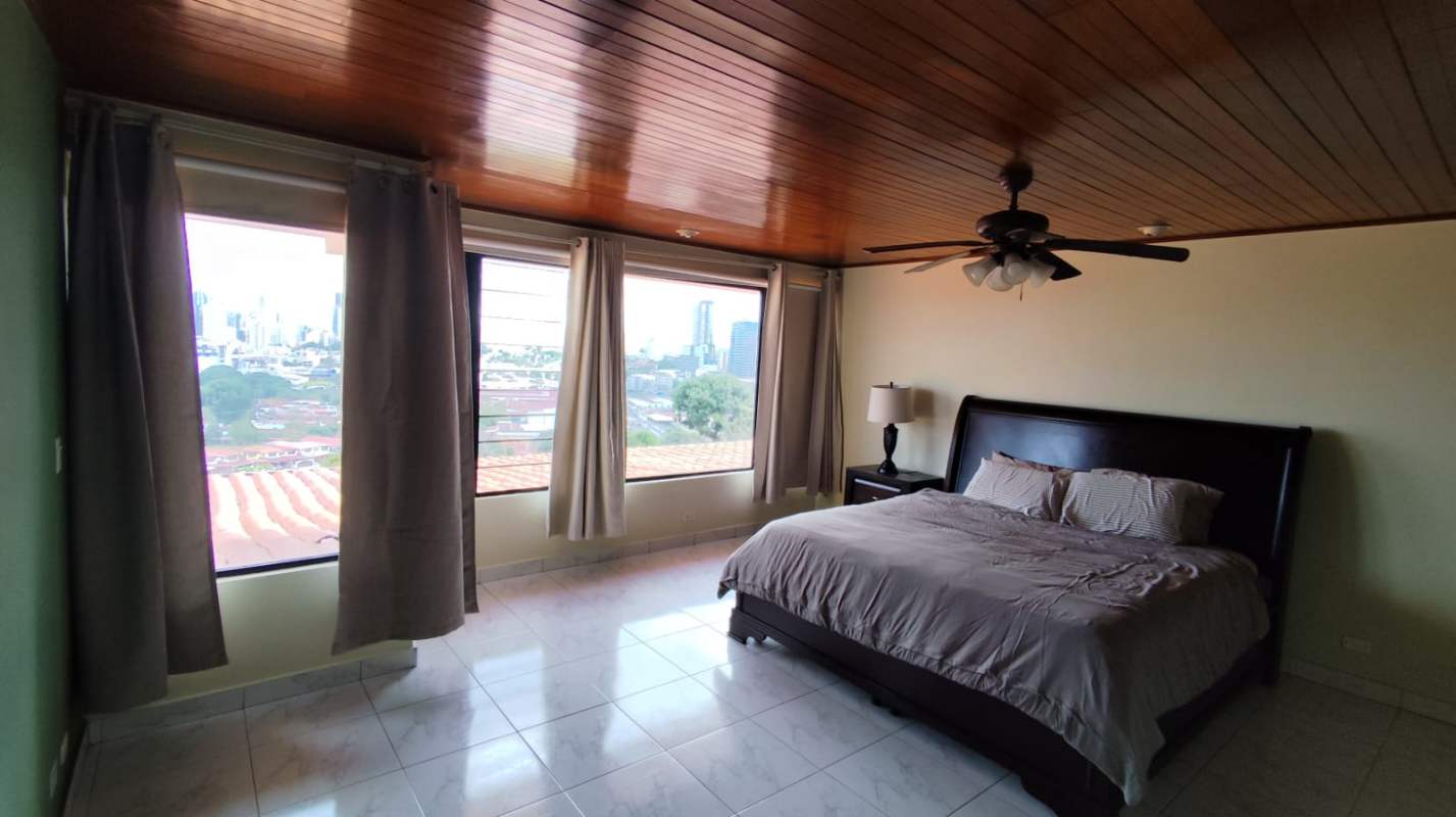 Marble tiled spacious bathroom double sinks mirror luxury home Betania