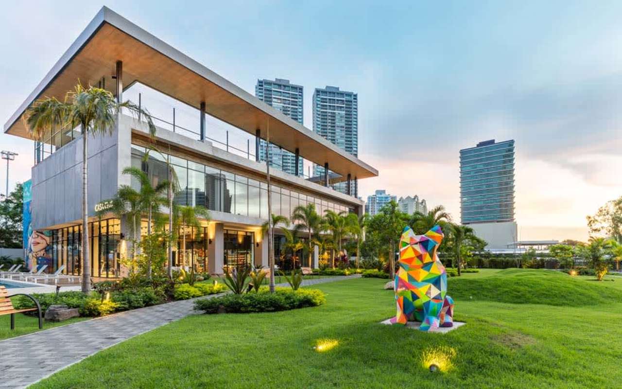 Modern luxury complex glass facade with gardens Country Club Costa del Este Panama