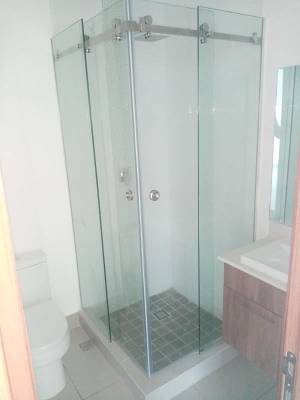 Open plan living dining room with large windows city view PH Vista City Panama