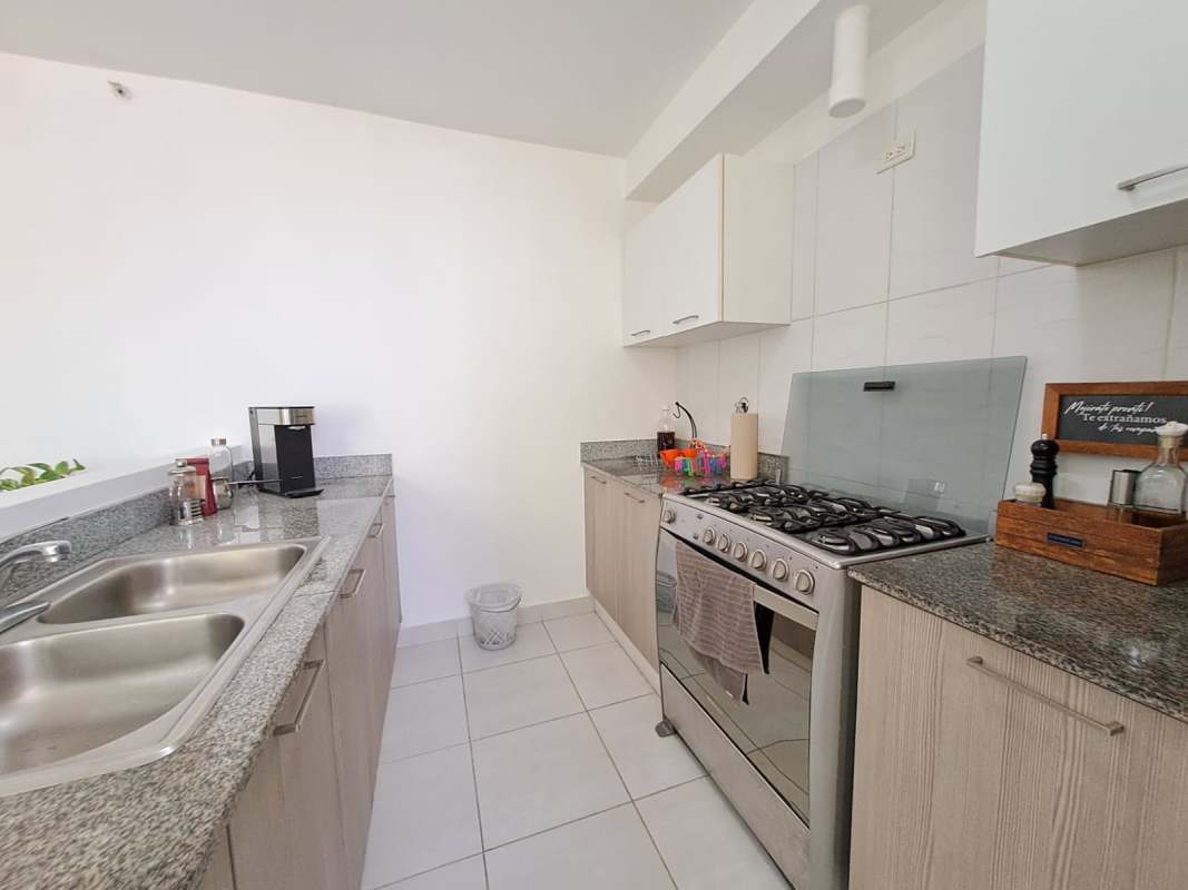 Laundry closet with stacked washer dryer utility sink Carrasquilla Panama